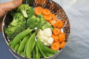 Steaming vegetables.