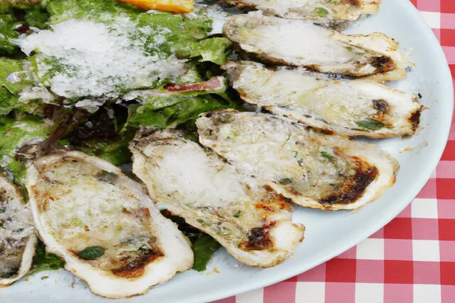 Grilled Oysters and Parmesan Cheese