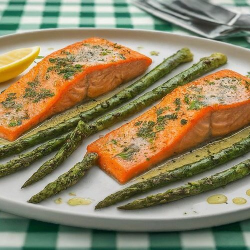 Plated baked salmon with roasted asparagus
