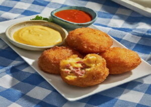 Plated corned beef and cheese fritters