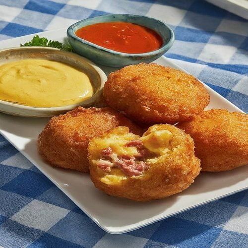 Plated corned beef and cheese fritters